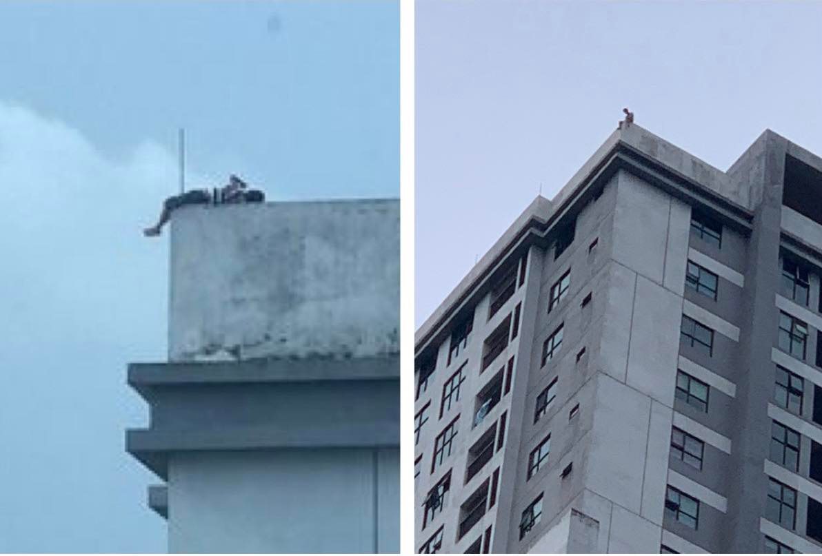 Người đàn ông nằm vắt vẻo, la hét trên nóc chung cư cao tầng ở Hà Nội - ảnh 1