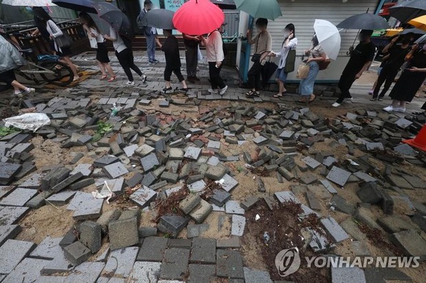 Hàn Quốc: Mưa lớn kỷ lục ở Seoul khiến 7 người thiệt mạng - ảnh 11