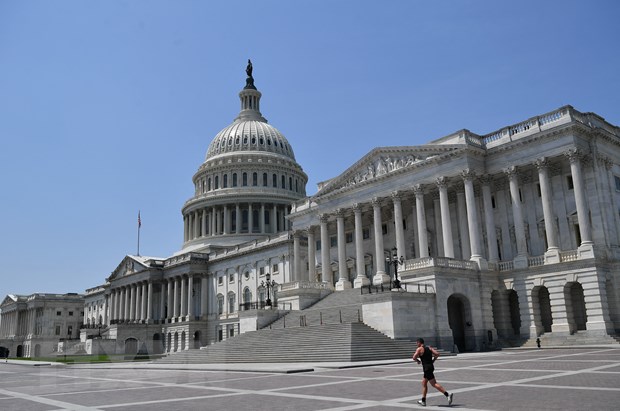 Quốc hội Mỹ thông qua dự luật về thuế, chăm sóc sức khỏe và khí hậu - ảnh 1