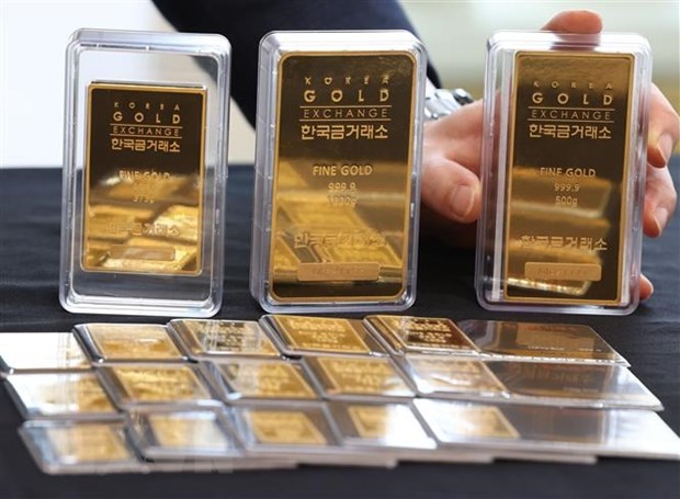 Giá vàng châu Á giảm xuống gần mức thấp nhất trong hai tuần - ảnh 1