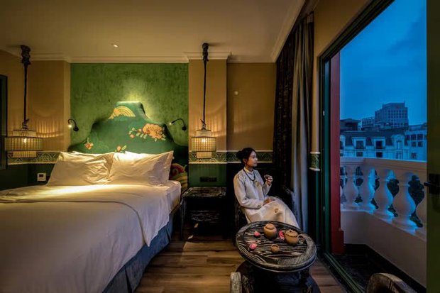 Bên trong “khách sạn di sản” duy nhất sở hữu bức tranh Hàng Trống lớn nhất: Tái hiện nét đẹp Thăng Long xưa độc đáo - ảnh 3