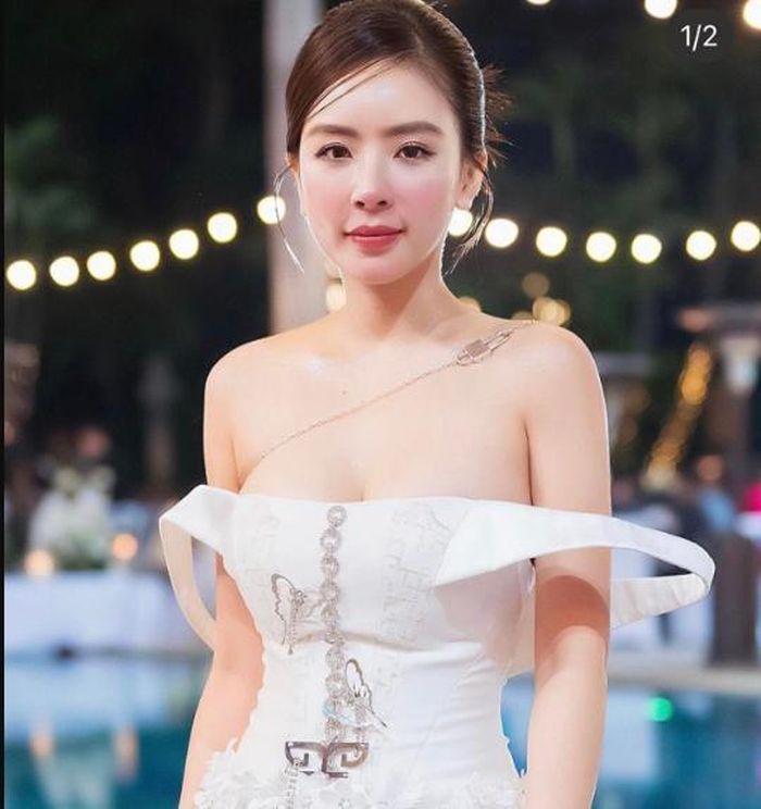 Hot girl Hà Nội mặc váy quây gây tranh cãi trong tiệc cưới - ảnh 1