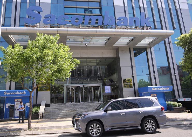 Ngân hàng Sacombank đại hạ giá gần 9.000 tỷ đồng cho hai khoản nợ lớn - ảnh 1