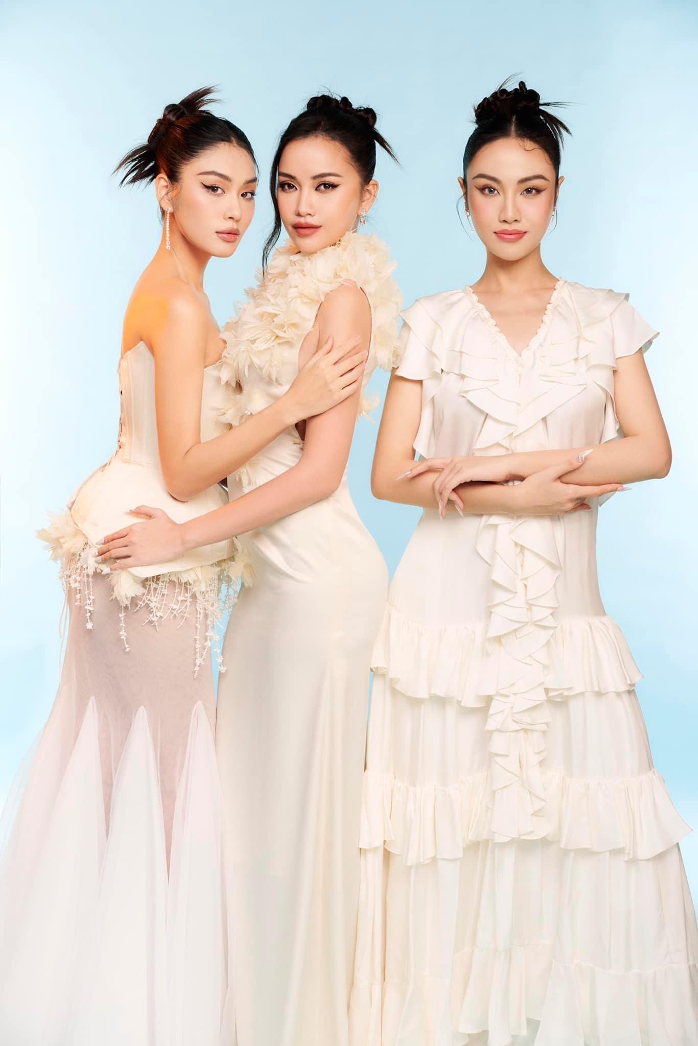 Bộ 3 Hoa hậu Hoàn vũ cùng nhau khoe sắc ngày Tết với sắc trắng trang nhã - ảnh 1