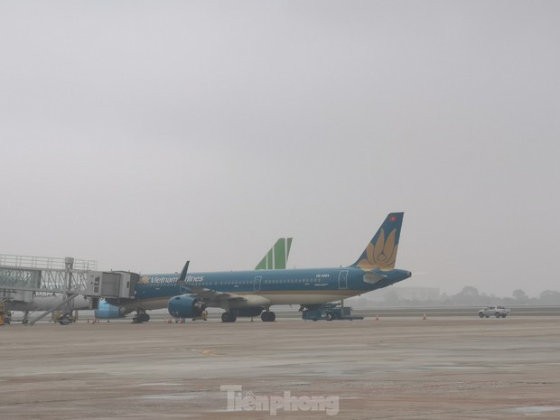 Thời tiết xấu, mù mịt, mưa phùn có ảnh hưởng đến hoạt động của sân bay Nội Bài? - ảnh 4