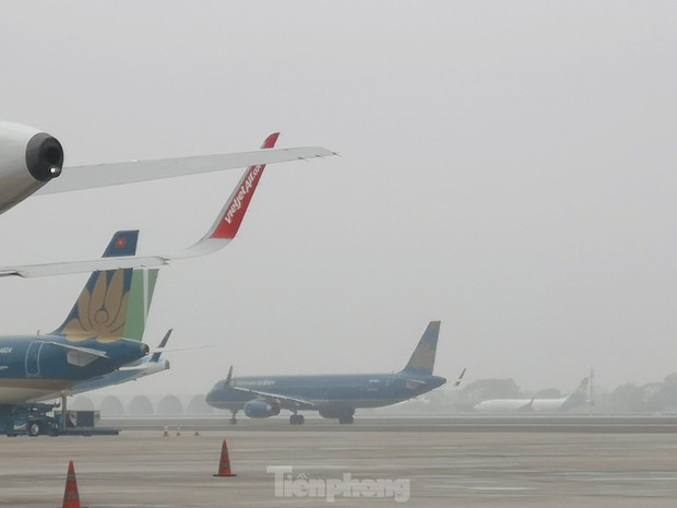 Thời tiết xấu, mù mịt, mưa phùn có ảnh hưởng đến hoạt động của sân bay Nội Bài? - ảnh 3