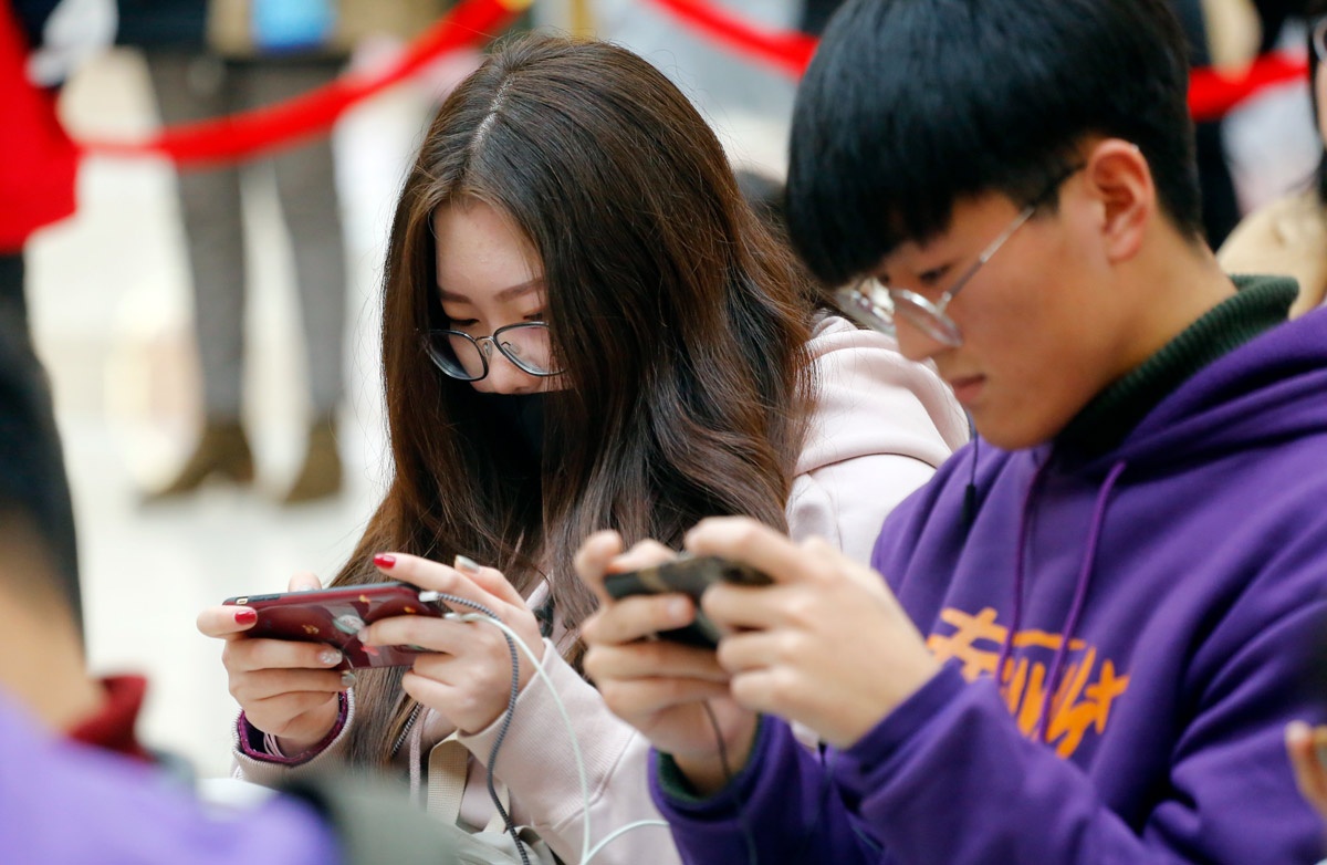 Thanh niên Trung Quốc chơi game dễ kiếm người yêu hơn - ảnh 1