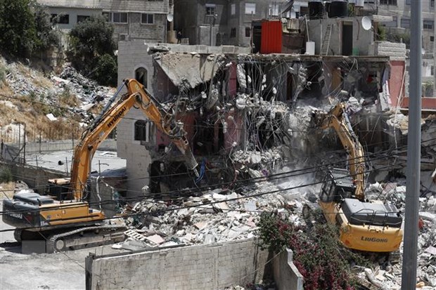 Israel dừng phá hủy tòa nhà của người Palestine do sức ép quốc tế - ảnh 1