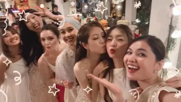Á hậu Thùy Dung lên đồ xinh đẹp, cùng ông xã tham dự tiệc cưới của Kylie Yeo - đối thủ của cô ở Miss International 2017 - ảnh 3