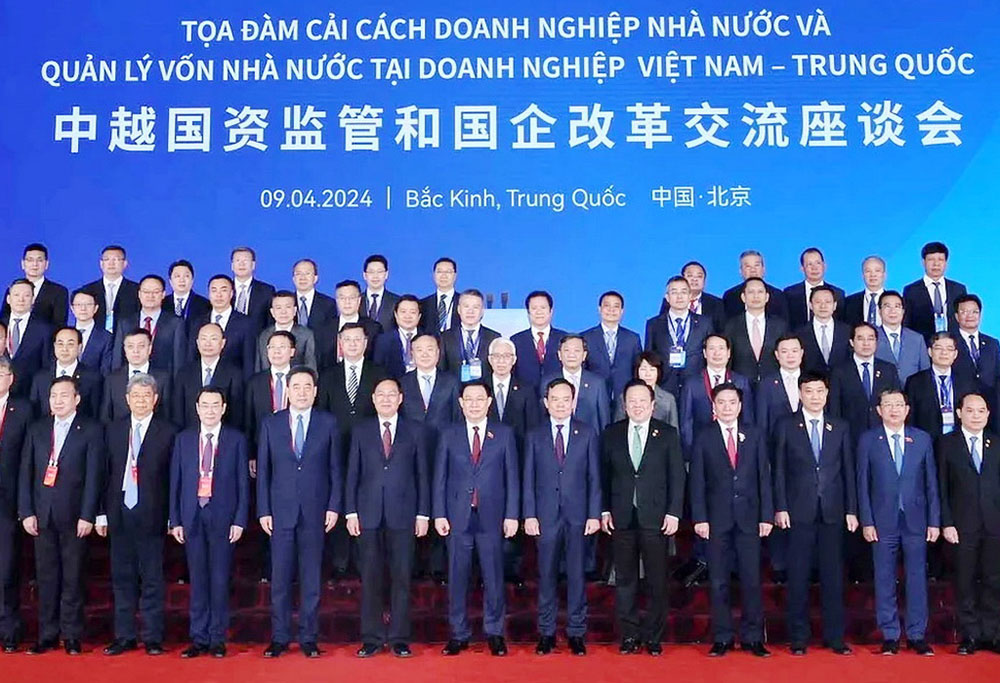 Việt Nam - Trung Quốc trao đổi kinh nghiệm cải cách doanh nghiệp nhà nước - ảnh 1