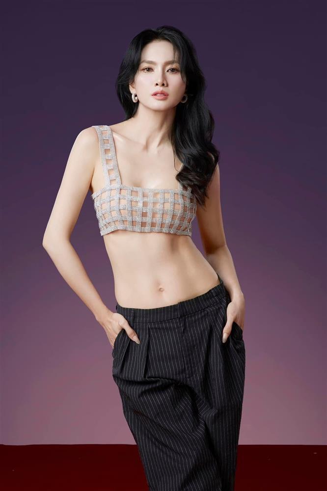 Siêu mẫu Việt U40 diện váy áo ướt nước 'hot' nhất ở lễ hội té nước Thái Lan - ảnh 5