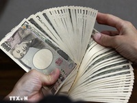 Đồng USD mạnh lên khiến đồng yen xuống gần mức thấp nhất trong 34 năm
